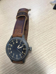 Steinhart on Mauser with black stitching
