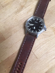 Mauser with Brown stitching on a Sinn